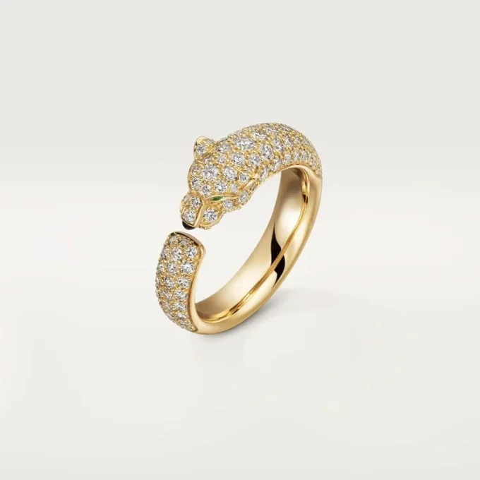 Anillo Panthere de Cartier – Oro amarillo, esmeraldas, ónix, diamantes – Cartier