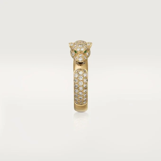 Anillo Panthere de Cartier – Oro amarillo, esmeraldas, ónix, diamantes – Cartier
