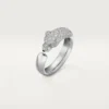 Anillo Panthere de Cartier – Oro blanco, esmeraldas, ónix, diamantes – Cartier