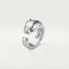 Anillo Panthere De Cartier – Oro blanco, granates tsavorita, ónix – Cartier