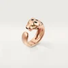 Anillo Panthere de Cartier – Oro rosa, granates tsavorita, ónix – Cartier