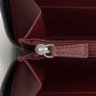 Billetera internacional con cremallera, Must de Cartier – Piel de becerro negra, acabado en paladio – Cartier