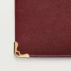 Billetera internacional con fuelles, Must de Cartier – Piel de becerro color burdeos, acabado dorado – Cartier Billetera internacional con fuelles, Must de Cartier – Piel de becerro color burdeos, acabado dorado – Cartier