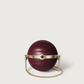 Bolso redondo con motivo gadroon, Cartier Soir
