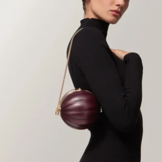 Bolso redondo con motivo gadroon, Cartier Soir