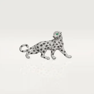Broche Panthere de Cartier – Oro blanco, esmeraldas, ónix, diamantes – Cartier