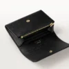 Cartera, C de Cartier