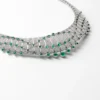 Collar «Le Voyage Recommence», esmeraldas, pavé