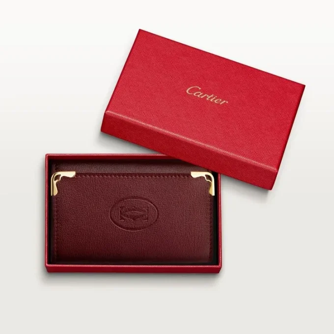 Llavero de 6 llaves, Must De Cartier – Piel de becerro burdeos, acabado dorado – Cartier