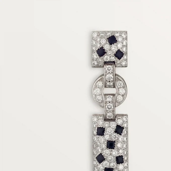 Pendientes Panthere de Cartier – Oro blanco, esmeraldas, ónix, diamantes – Cartier