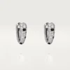 Pendientes pequeños de aro Panthere Diamond, oro blanco | Cartier Us