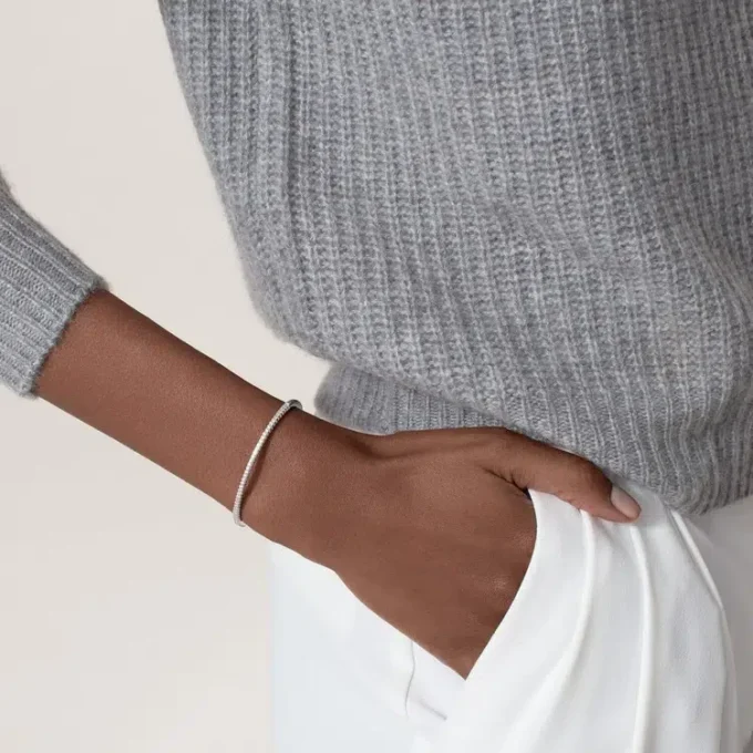 Pulsera Etincelle De Cartier, con medio pavé